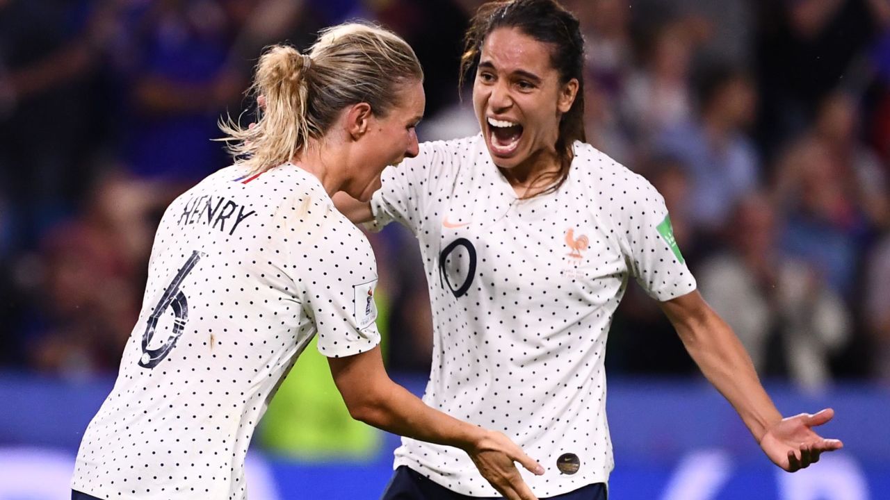 France's midfielder Amandine Henry celebrates after putting her side 2-1 ahead in extra time of the last 16 Women's World Cup clash against Brazil in Le Havre.