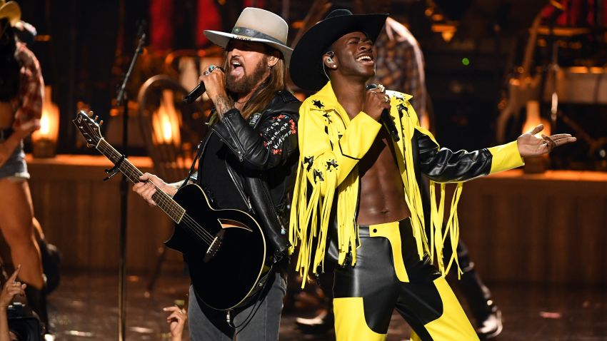 Billy Ray Cyrus, left, and Lil Nas X, right, perform onstage at the 2019 BET Awards on June 23, 2019 in Los Angeles, California.
