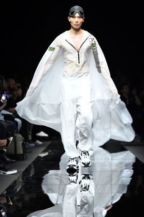 A model presents a creation for Emporio Armani during the presentation of its Men's Spring/Summer 2020 fashion collection on June 15, 2019 in Milan.