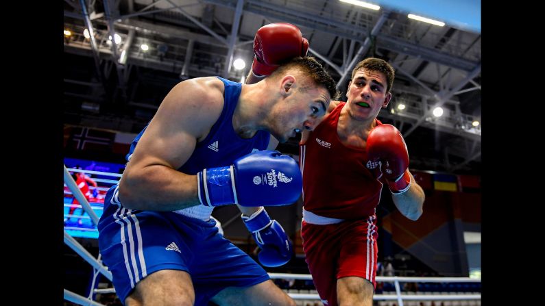 Tony Browne of Ireland, left, ducks under the right hand of Toni Filipi of Croatia during their Men's Heavyweight fight at Uruchie Sports Palace on Day 3 of the 2nd European Games in Minsk, Belarus on Sunday, June 23.