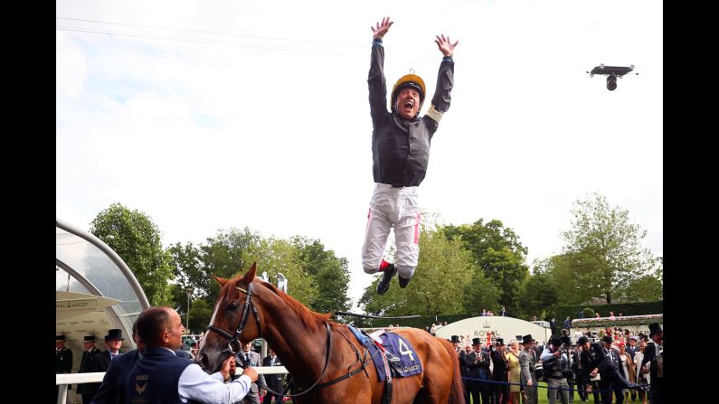 Frankie Dettori makes a flying dismount from Stradivarius after winning The Gold Cup on Day 3 of Royal Ascot at Ascot Racecourse on June 20.