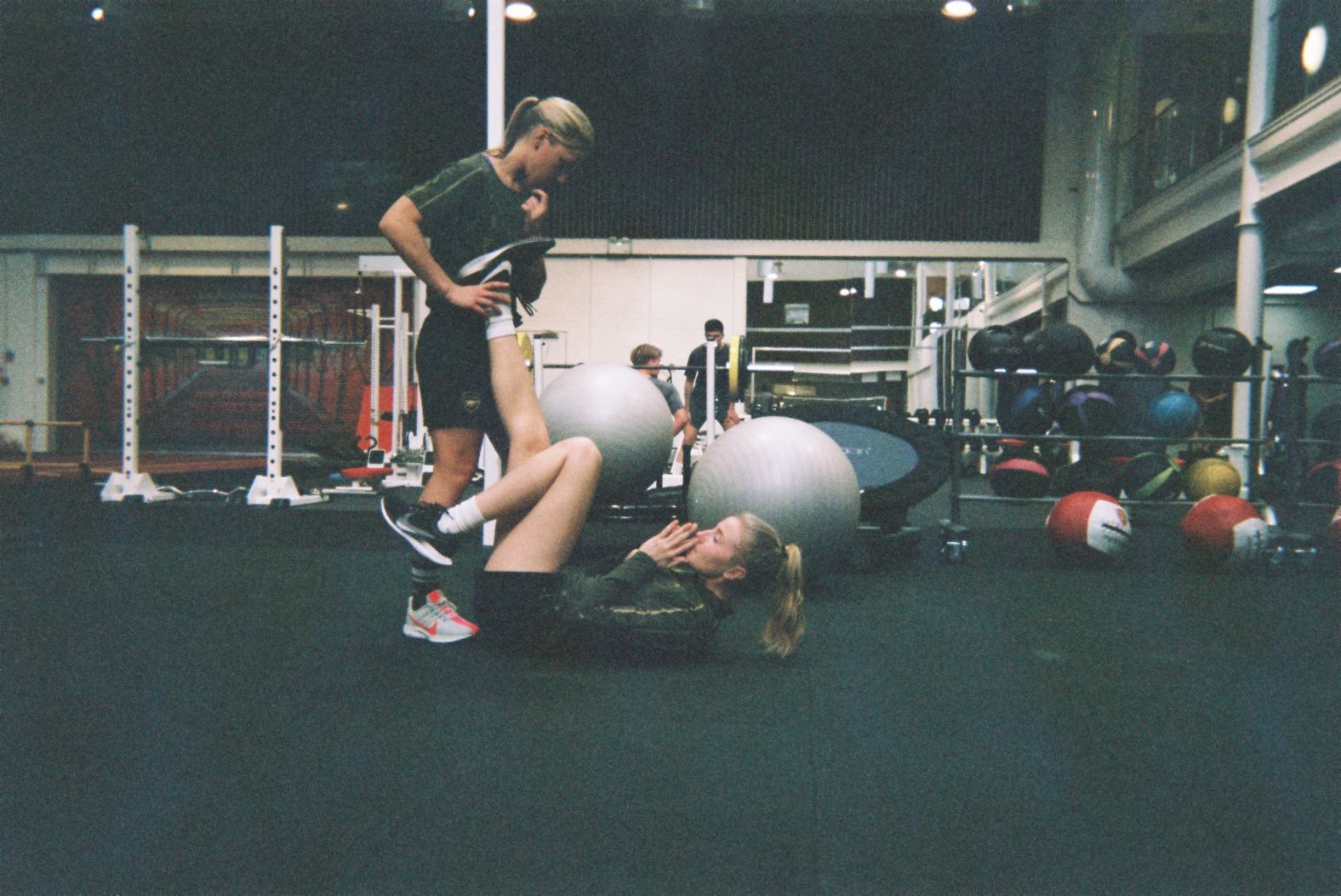 <strong>Photographer:</strong> Beth Mead, England & Arsenal<br /><strong>Location:</strong> Arsenal Training Ground, UK<br /><br />"Leah Williamson and Jordan Nobbs were limbering up before a hard training session with Arsenal Women. This is something we do every day before training so we are ready to attack the session. It represents our professionalism and I wanted to show people what is behind the players on the pitch and what we do that people don't see. It was during Jordan's rehab. Jordan is the ultimate pro. She wants the best for every single one of her teammates. And she was so proud when she found out both me and Leah were going to a World Cup. It shows what an amazing human being she is. She is someone I look up to every day!"