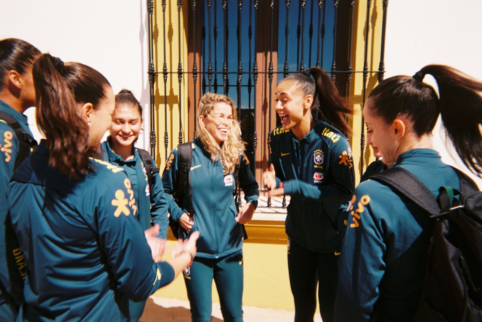 <strong>Photographer:</strong> Aline Reis, Brazil & UD Granadilla Tenerife<br /><strong>Location:</strong> Don Benito, Spain<br /><br />"My teammates Letícia, Tamires, Kathellen, and Luana were chit chatting before practice. The fun and laughter we share, the experiences and challenges we overcome...TOGETHER. It makes us who we are, it makes us footballers."