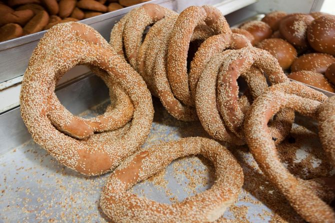 <strong>Koulouria (Κουλούρια): </strong>These delicious rings of baked bread dough covered in sesame seeds are available from street vendor stands in every Greek city. 