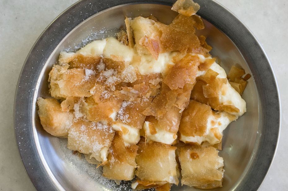 <strong>Bougatsa (Μπουγάτσα): </strong>Hailing from Thessaloniki, this traditional Greek dessert consists of filo pastry wrapped around a sweet semolina-based custard. 