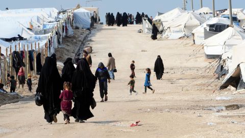 People in the al-Hol camp, which houses relatives of ISIS group members, in the camp in March.