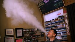 SAN FRANCISCO, CA - MAY 05:  Christopher Chin blows vapor from an e-cigarette at Gone With the Smoke Vapor Lounge on May 5, 2016 in San Francisco, California. The U.S. Food and Drug Administration announced new federal regulations on electronic cigarettes that will be the same as traditional tobacco cigarettes and chewing tobacco.  (Photo by Justin Sullivan/Getty Images)