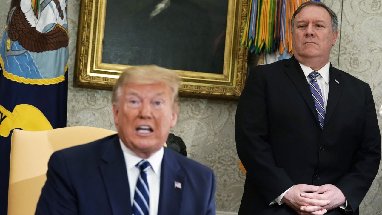 WASHINGTON, DC - JUNE 20:  U.S. Secretary of State Mike Pompeo looks on as President Donald Trump speaks during a meeting with Canadian Prime Minister Justin Trudeau in the Oval Office of the White House June 20, 2019 in Washington, DC. Trump and Trudeau were expected to discuss the trade agreement between the U.S., Canada and Mexico.  (Photo by Alex Wong/Getty Images)