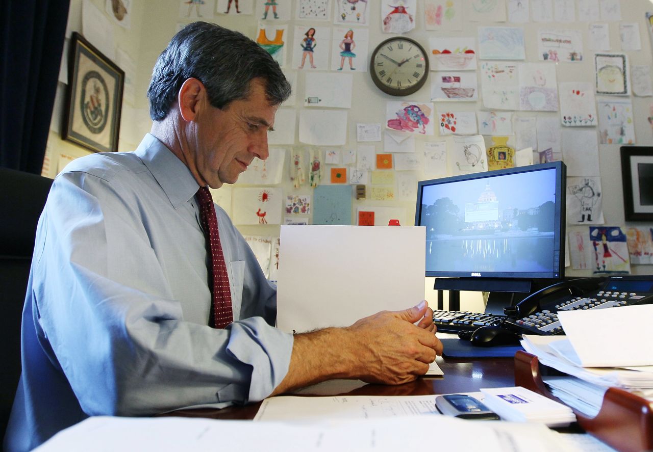 Sestak looks over papers in his office in May 2010.