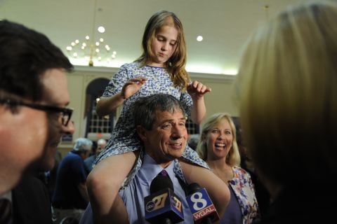 Sestak holds his daughter, Alex, in May 2010.