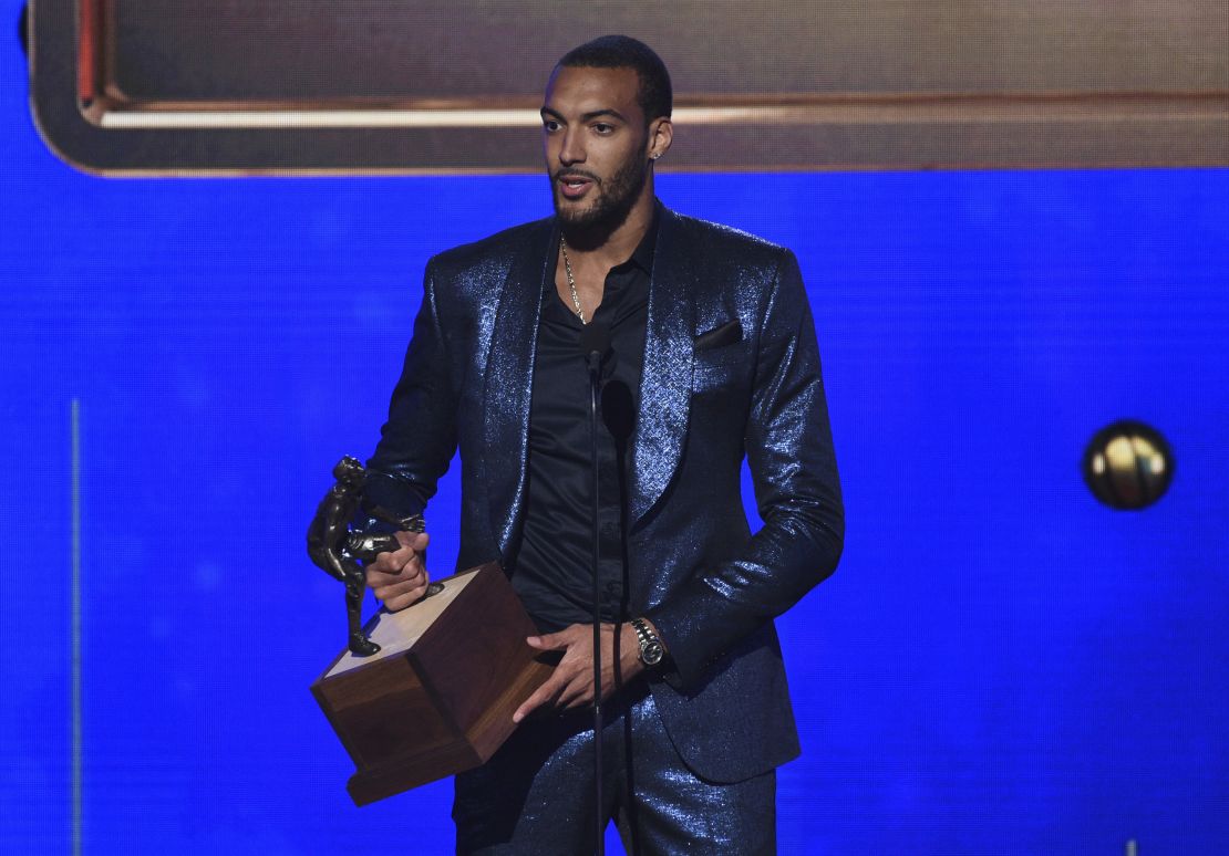 Rudy Gobert, of the Utah Jazz, accepts the NBA defensive player of the year award at the NBA Awards.