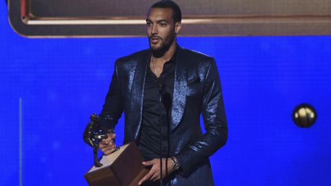 Rudy Gobert, of the Utah Jazz, accepts the NBA defensive player of the year award at the NBA Awards.