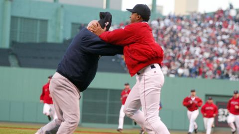 Boston Red Sox pitcher Pedro Martinez (R), throws 72-year-old New York Yankees coach Don Zimmer to the ground during an altercation in Game 3 of the American League championship series in Boston in 2003. Martinez called the incident the biggest regret of his career.
