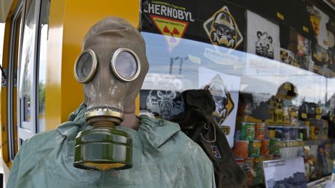 Visitors buy snacks and souvenirs at a souvenir shop next to the Dytyatky checkpoint after a tour in the Chernobyl exclusion zone, on June 7, 2019. HBO's hugely popular series Chernobyl has renewed interest around the world in the 1986 nuclear disaster.