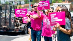 IRVINE, CA - JUNE 19: Protestors hold signs during Stop the Bans Speak Out Tour at the corner of Culver Drive and Alton Parkway in Irvine, CA on Wednesday, June 19, 2019. The pro-choice rally was part of a week of protests in San Bernardino and Orange counties against recent abortion bans and stricter laws nationwide. Similar lunchtime rallies will be held Thursday in Brea and Friday in Huntington Beach. (Photo by Paul Bersebach/MediaNews Group/Orange County Register via Getty Images)