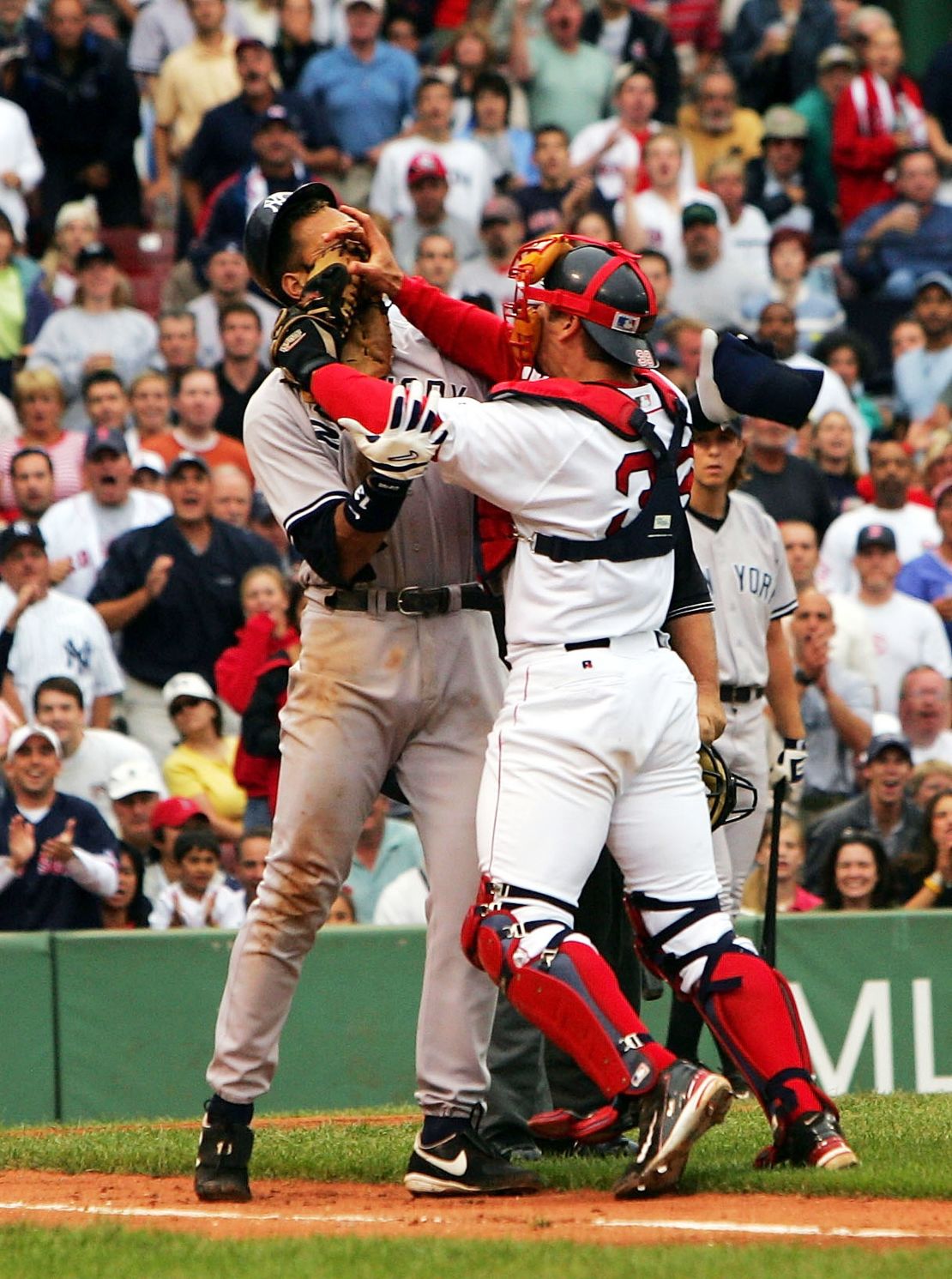 Images of the 2004 dust-up between Rodriguez (L) and Boston's Jason Varitek have been enshrined on the walls of Boston sports bars ever since. 