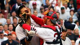BOSTON - JULY 24:  Alex Rodriguez #13 of the New York Yankees gets into a fight with catcher Jason Varitek #33 of the Boston Red Sox after Rodriguez was hit by a pitch in the third inning on July 24, 2004 at Fenway Park in Boston, Massachusetts.  (Photo by Ezra Shaw/Getty Images)