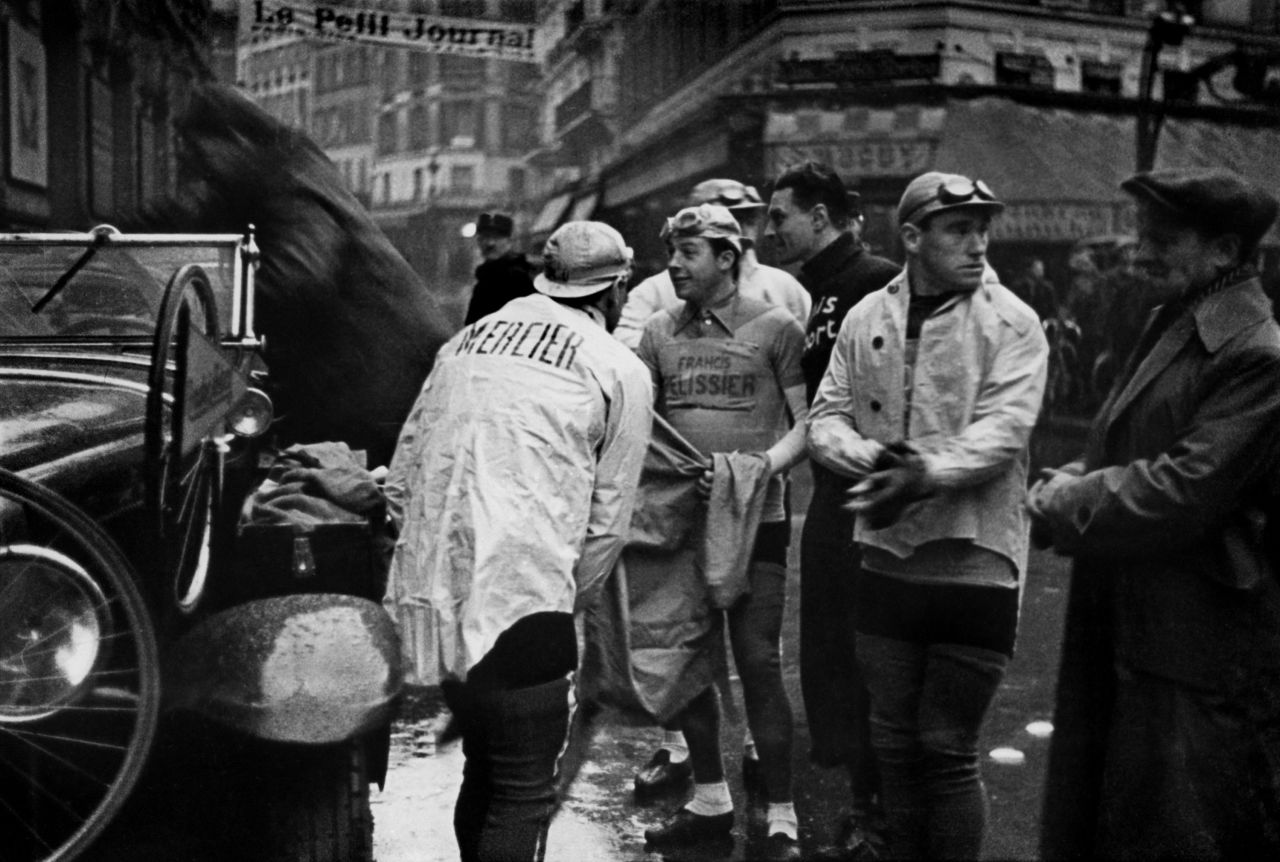 Cyclists take a break to put on rain gear as a storm drenches the course. Capa had a particularly sharp eye for capturing quiet moments, even in the midst of chaos. "If your pictures aren't good enough, you aren't close enough," he once said. In 1947, Capa founded Magnum Photos with Henri Cartier-Bresson, David Seymour, George Rodger and William Vandivert.