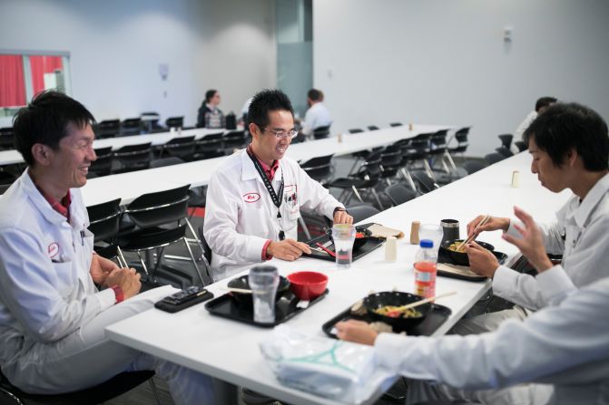 Japanese associates eat lunch at the Honda plant. The cafeteria's options include Japanese cuisine. Over the decades, local businesses in Ohio have expanded to cater to the Japanese population. 