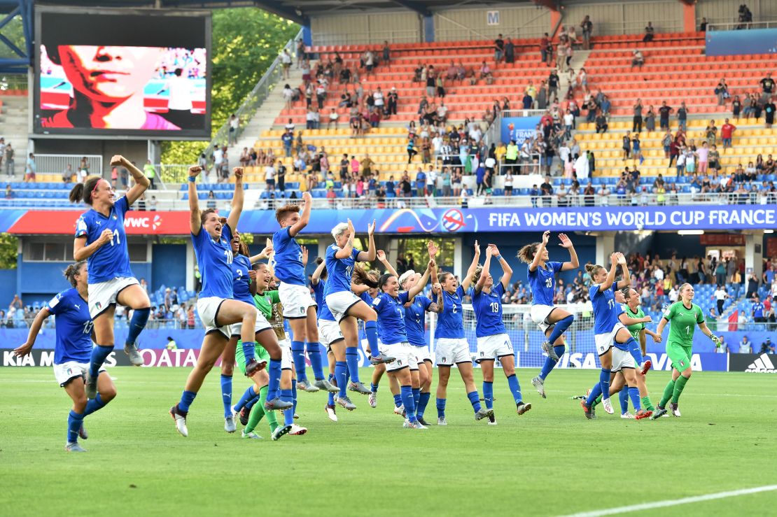 Italy's players celebrate reaching the quarterfinals. The first time the country has done so since 1991. 