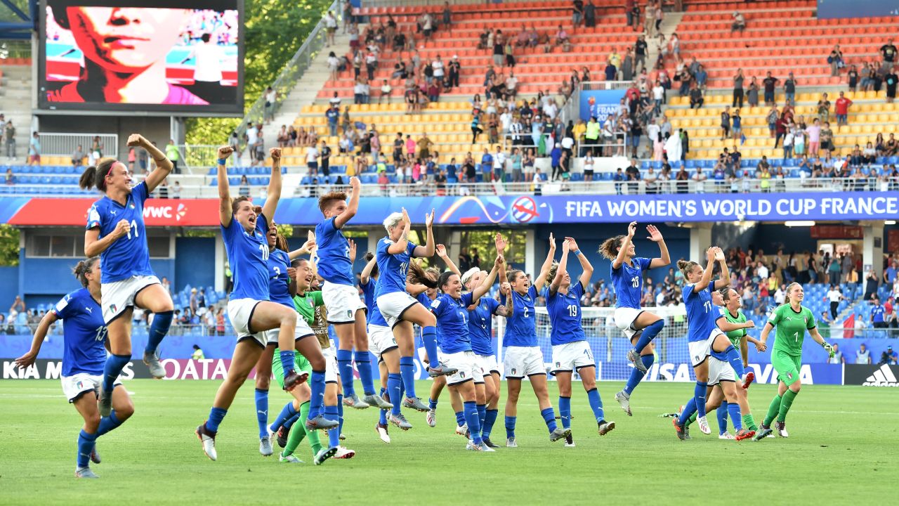 Italy's players celebrate reaching the quarterfinals. The first time the country has done so since 1991. 