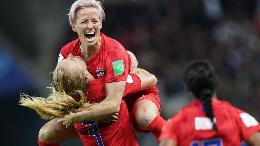 United States' midfielder Sam Mewis (L) celebrate with United States' forward Megan Rapinoe (C) after scoring a goal during the France 2019 Women's World Cup Group F football match between USA and Thailand, on June 11, 2019, at the Auguste-Delaune Stadium in Reims, eastern France. (Photo by Lionel BONAVENTURE / AFP)        (Photo credit should read LIONEL BONAVENTURE/AFP/Getty Images)