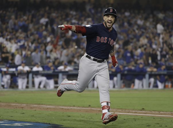 Steve Pearce of the Red Sox celebrates his second home run during the eighth inning in Game 5 of the 2018 World Series against the Los Angeles Dodgers. The Red Sox won the series 4-1, marking Boston's ninth MLB championship.