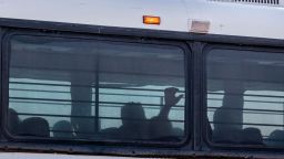A bus transporting immigrants leaves a temporary facility at a US Border Patrol Station in Clint, Texas, on June 21, 2019. - Lawyers who were able to tour the facility under the Flores Settlement, which governs detention conditions for migrant children, said they witnessed inhumane conditions of overcrowding, and about 250 children being held over the limit of 72 hours, some saying they were there for weeks in overcrowded cells. (Photo by Paul Ratje / AFP)        (Photo credit should read PAUL RATJE/AFP/Getty Images)