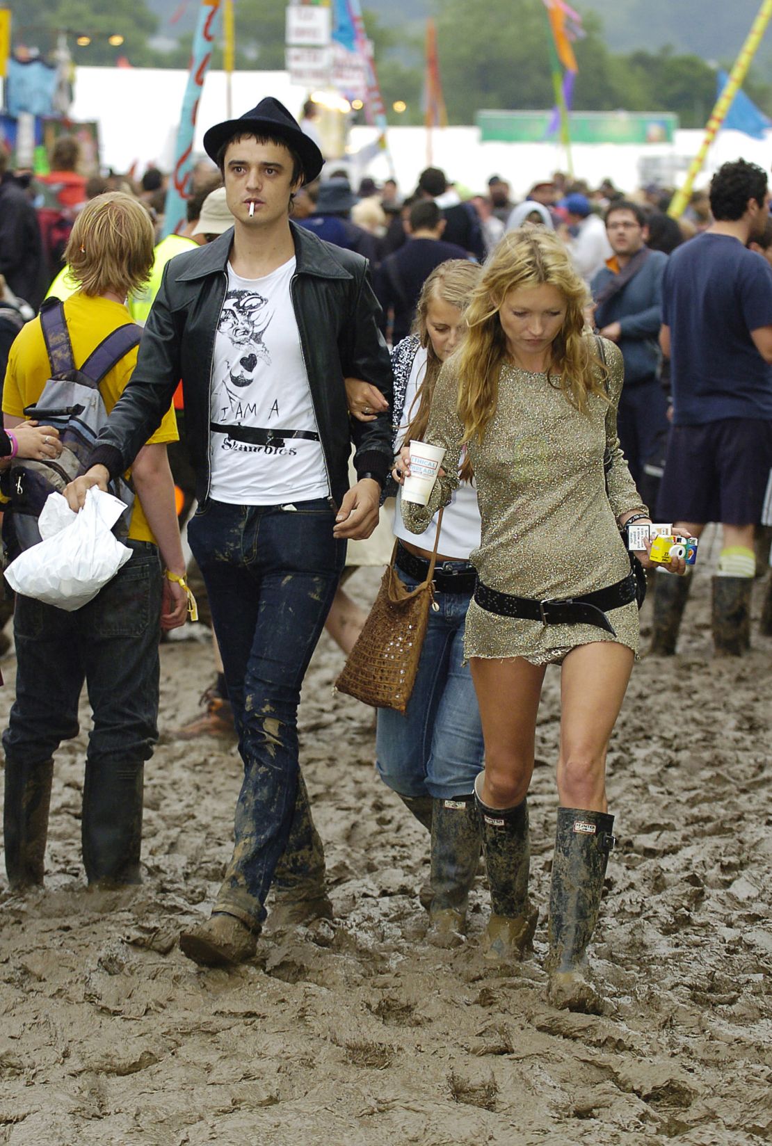 Pete Doherty and Kate Moss are seen at the Glastonbury Music Festival 2005.