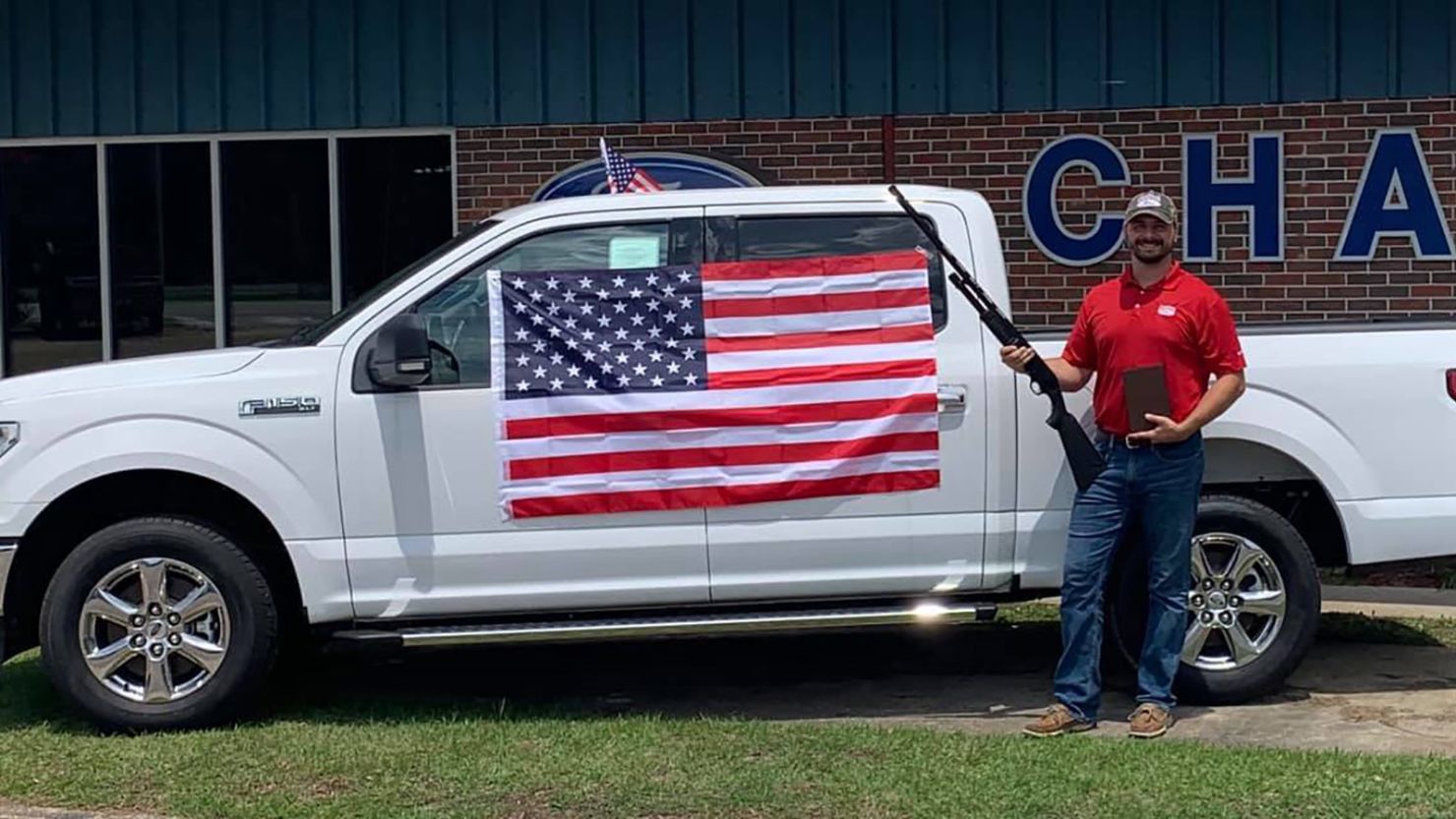 Chatom Ford in Alabama is giving away bibles, American flags and gift certificates for a shotgun to customers who purchase any new or used vehicle throughout July. 