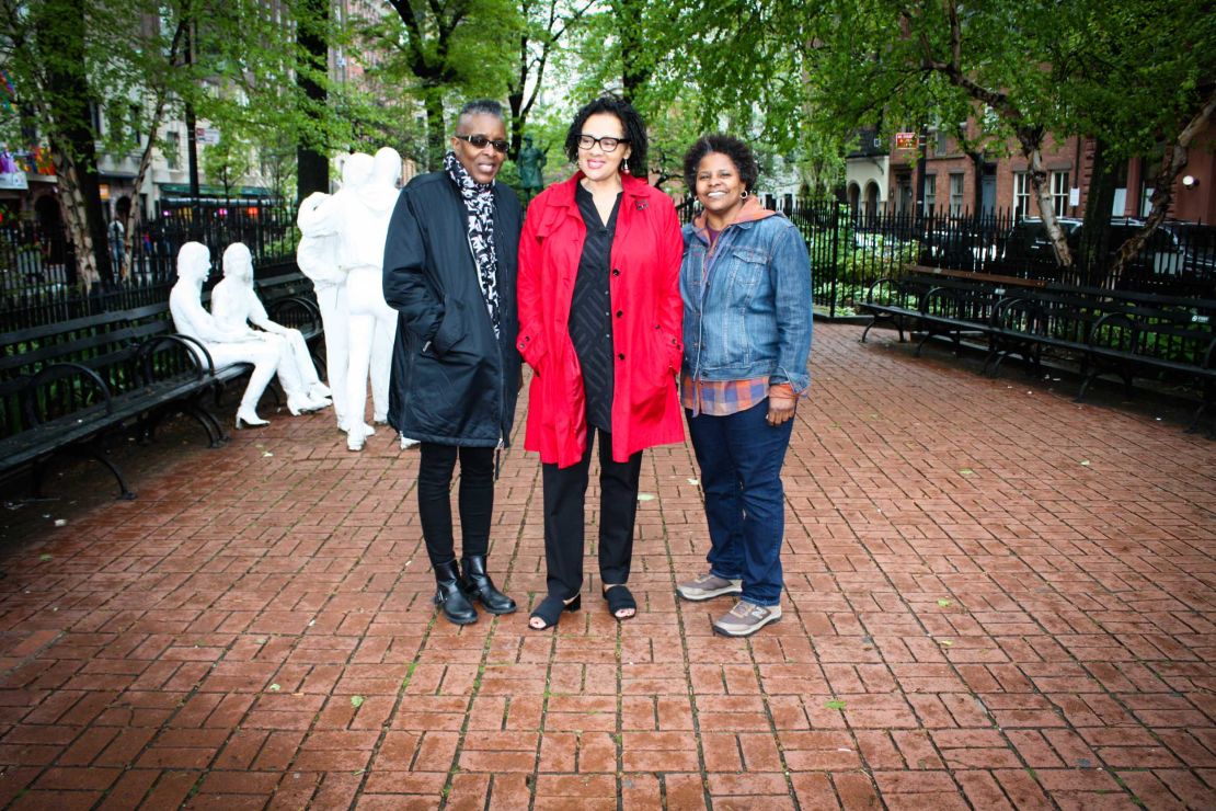 Afua Kafi-Akua (left), Maria-Elena Grant (center) and Karla McNeal visit Christopher Park. 