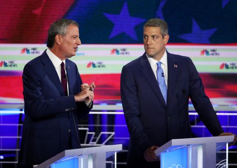 Ryan, right, looks at de Blasio as the New York mayor answers a question on Wednesday.