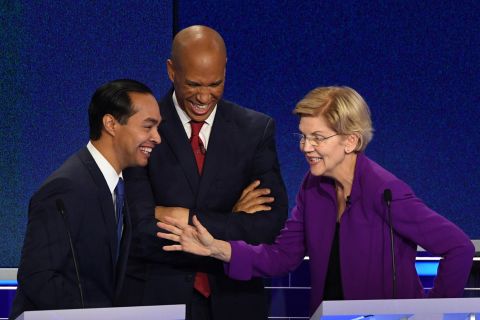 From left, Castro, Booker and Warren share a laugh during a commercial break on Wednesday.