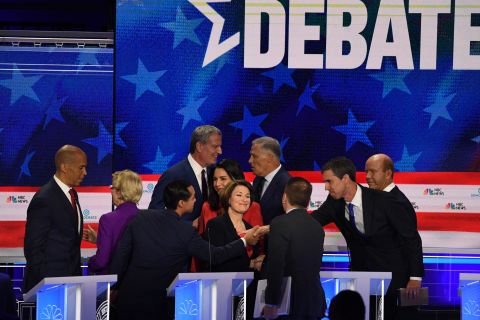 Candidates greet each other at the end of Wednesday's debate.