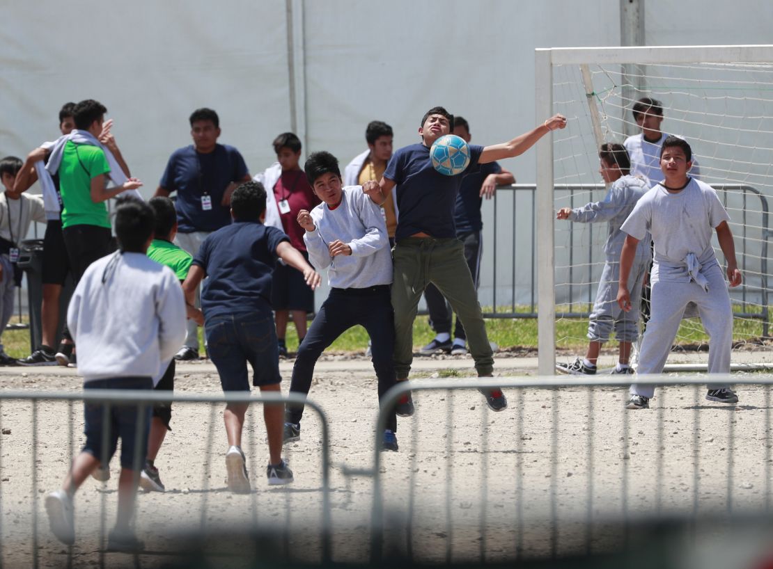 Children play soccer at the Homestead shelter for unaccompanied minors. 