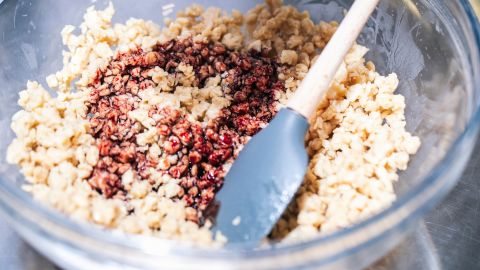 Heme is added to a bowl of soy-based mixture in the test kitchen.