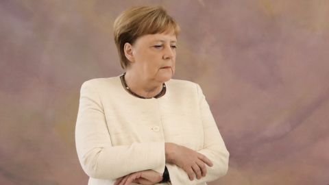 German Chancellor Angela Merkel attends a ceremony where the country's new Justice Minister was given her certificate of appointment by the German President at the presidential Bellevue Palace in Berlin on June 27, 2019. - During the ceremony, Merkel suffered a new shaking spell, just one week after sparking concerns by visibly trembling at another official ceremony. (Photo by Kay Nietfeld / dpa / AFP) / Germany OUT (Photo credit should read KAY NIETFELD/AFP/Getty Images)