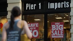 A pedestrian walks past a Pier 1 Imports Inc. store in New York, U.S., on Tuesday, June 17, 2014. Pier 1 Imports Inc. is scheduled to release earnings figures on June 19. Photographer: Craig Warga/Bloomberg via Getty Images