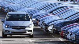 Cars branded with Opel badges are prepared for distribution at Vauxhall's production plant in Ellesmere Port, in Cheshire, north-west England, on March 6, 2017. 
French carmaker PSA announced on March 6 the acquisition of General Motors' European subsidiary, which includes the Opel and Vauxhall brands, for 1.9 billion GBP. / AFP PHOTO / Paul ELLIS        (Photo credit should read PAUL ELLIS/AFP/Getty Images)