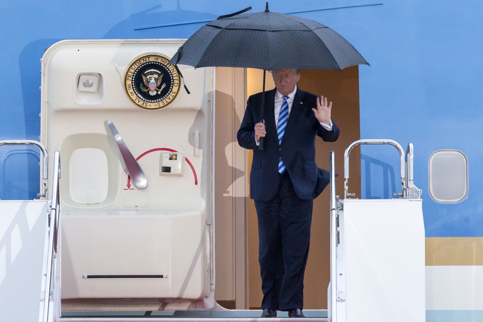 US President Donald Trump arrives at the Osaka International Airport for the G20 summit. 