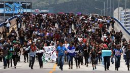 Students of the National Autonomous University of Honduras (UNAH) take part in a demonstration to demand the resignation of Honduran President Juan Orlando Hernandez in Tegucigalpa on June 25, 2019. - Ongoing protests against Hernandez -which started more than a month ago called by doctors and teachers against health and education laws- intensified last week when three people were killed. On the eve, Honduran military police opened fire on protesting students at a university, wounding at least five, according to campus and hospital officials. (Photo by ORLANDO SIERRA / AFP)        (Photo credit should read ORLANDO SIERRA/AFP/Getty Images)