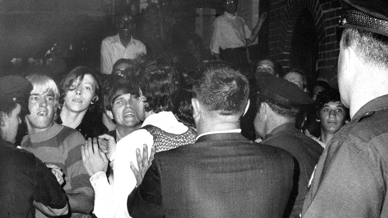 The crowd attempts to impede police arrests outside the Stonewall Inn on June 28, 1969.