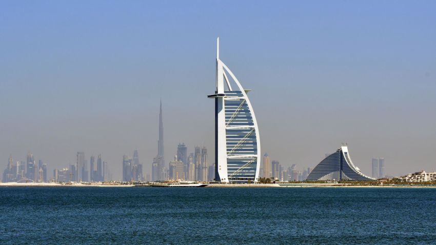 A picture taken on March 14, 2018 shows the skyline of Dubai with the Burj al-Arab (C-R) in the foreground and Burj Khalifa (C-L) in the background. / AFP PHOTO / GIUSEPPE CACACE        (Photo credit should read GIUSEPPE CACACE/AFP/Getty Images)