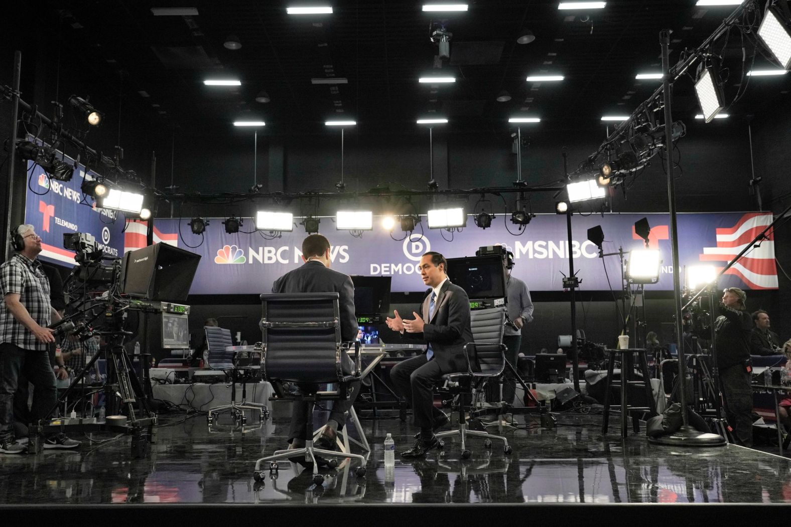 Julian Castro, a candidate who took part in Wednesday night's debate, is seen on a television set before the start of Thursday's debate. Castro was secretary of Housing and Urban Development during the Obama administration.