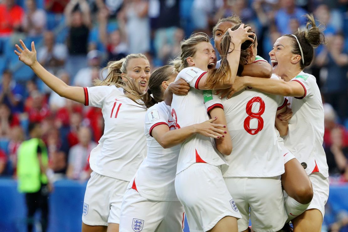 England's players celebate reaching the semifinals. 