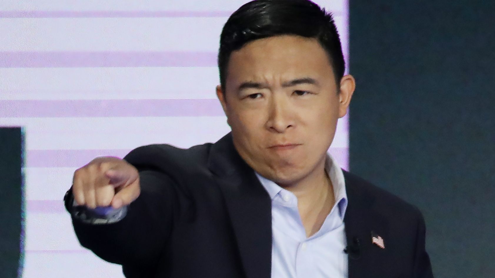 MIAMI, FLORIDA - JUNE 27:  Former tech executive Andrew Yang reacts during the second night of the first Democratic presidential debate on June 27, 2019 in Miami, Florida.  A field of 20 Democratic presidential candidates was split into two groups of 10 for the first debate of the 2020 election, taking place over two nights at Knight Concert Hall of the Adrienne Arsht Center for the Performing Arts of Miami-Dade County, hosted by NBC News, MSNBC, and Telemundo. (Photo by Drew Angerer/Getty Images)