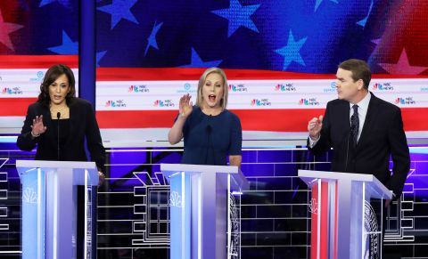 From left, Harris, Gillibrand and Bennet all try to speak at once during an early question on Thursday.