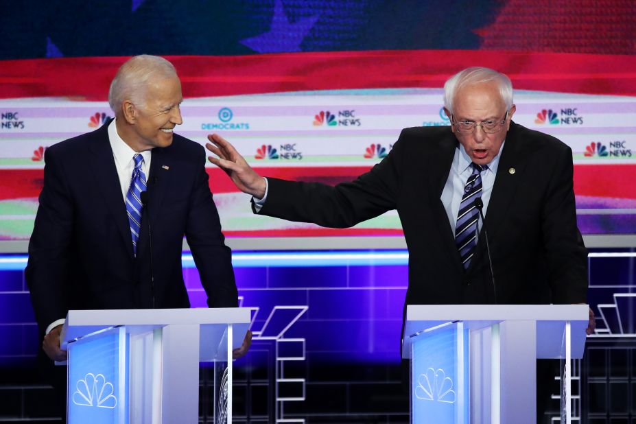 Sanders speaks next to former Vice President Joe Biden at the first Democratic debates in June 2019.