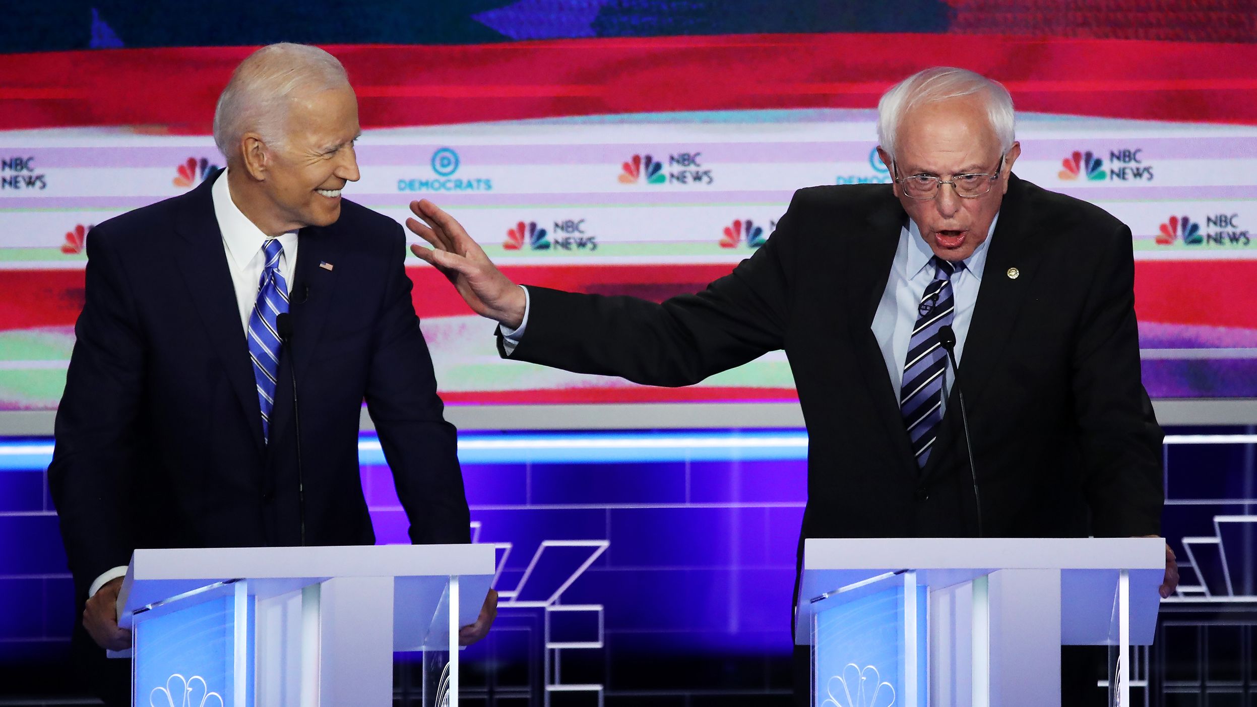 Sanders speaks next to former Vice President Joe Biden at the first Democratic debates in June 2019.
