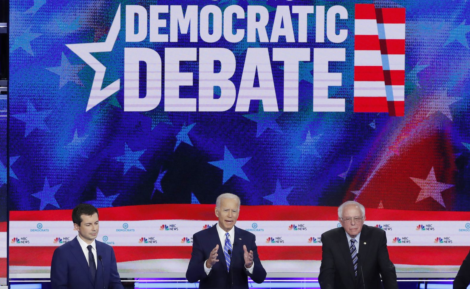 Biden, center, <a href="index.php?page=&url=https%3A%2F%2Fwww.cnn.com%2Fpolitics%2Flive-news%2Fdemocratic-debate-june-27-2019%2Fh_07c09554d7dd994336f022b7722ad23b" target="_blank">leads in national polls and in the polls of key early states</a> such as Iowa, New Hampshire, South Carolina and Nevada. And his leads are not small: He's usually up 15 to 20 points.